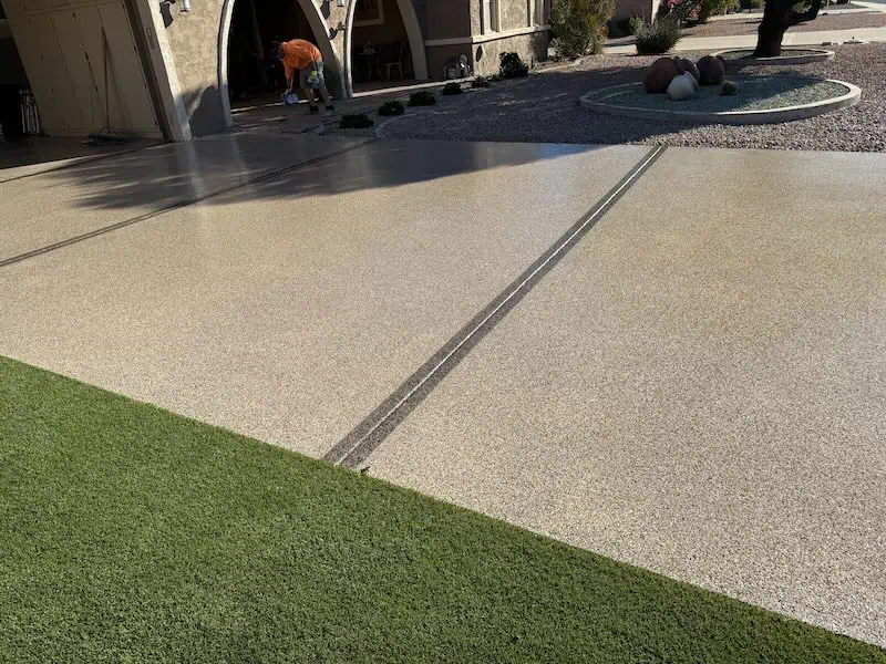 Desert textured driveway after protective sealer