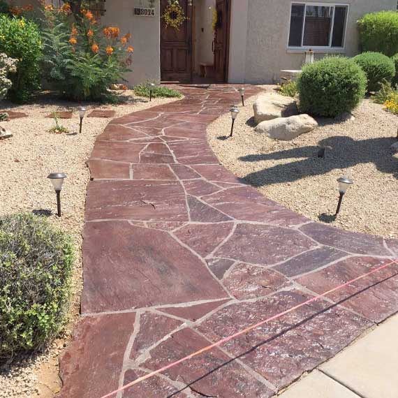 Paver and Flagstone Sealing in Arizona: Efflorescence, Joint Sand, and Wet Look vs Natural Finish