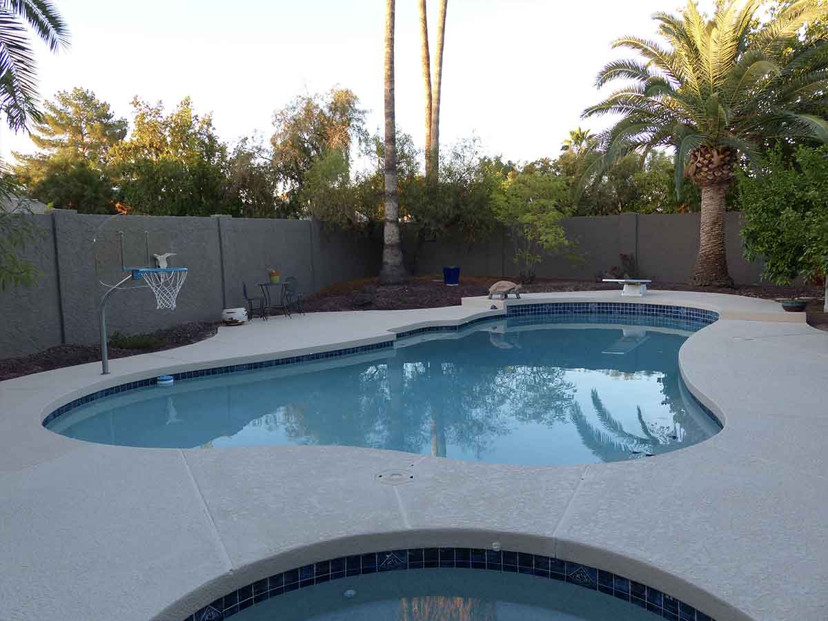 Finished Light Acrylic Kool Deck Around Residential Pool
