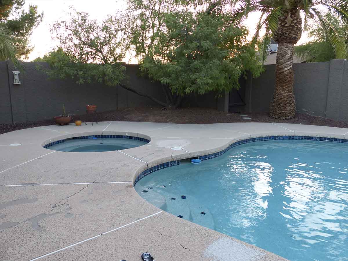 Before: Cracked Pool Deck Surface Around Spa